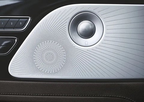 Two speakers of the available audio system are shown in a 2023 Lincoln Aviator® SUV | Pilson Lincoln in Mattoon IL