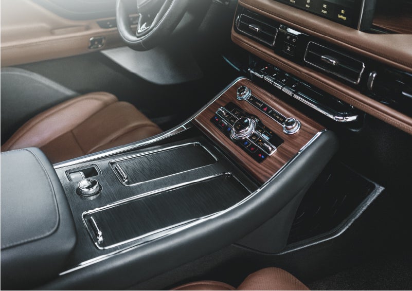 The front center console of a 2023 Lincoln Aviator® SUV is shown in | Pilson Lincoln in Mattoon IL