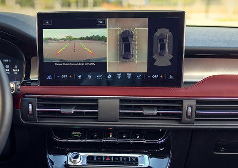 The driver of a 2024 Lincoln Corsair® SUV is shown selecting the drive mode. | Pilson Lincoln in Mattoon IL