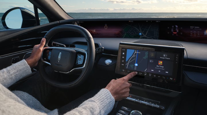 The driver of a 2024 Lincoln Nautilus® SUV interacts with the new Lincoln Digital Experience. | Pilson Lincoln in Mattoon IL